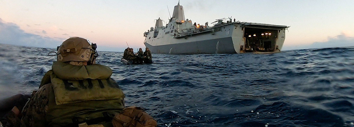 U.S. Marines with Battalion Landing Team 2/5, 31st Marine Expeditionary Unit, execute boat movements during a boat integration exercise aboard the USS New Orleans (LPD 18), in the East China Sea, Aug. 2, 2022. 